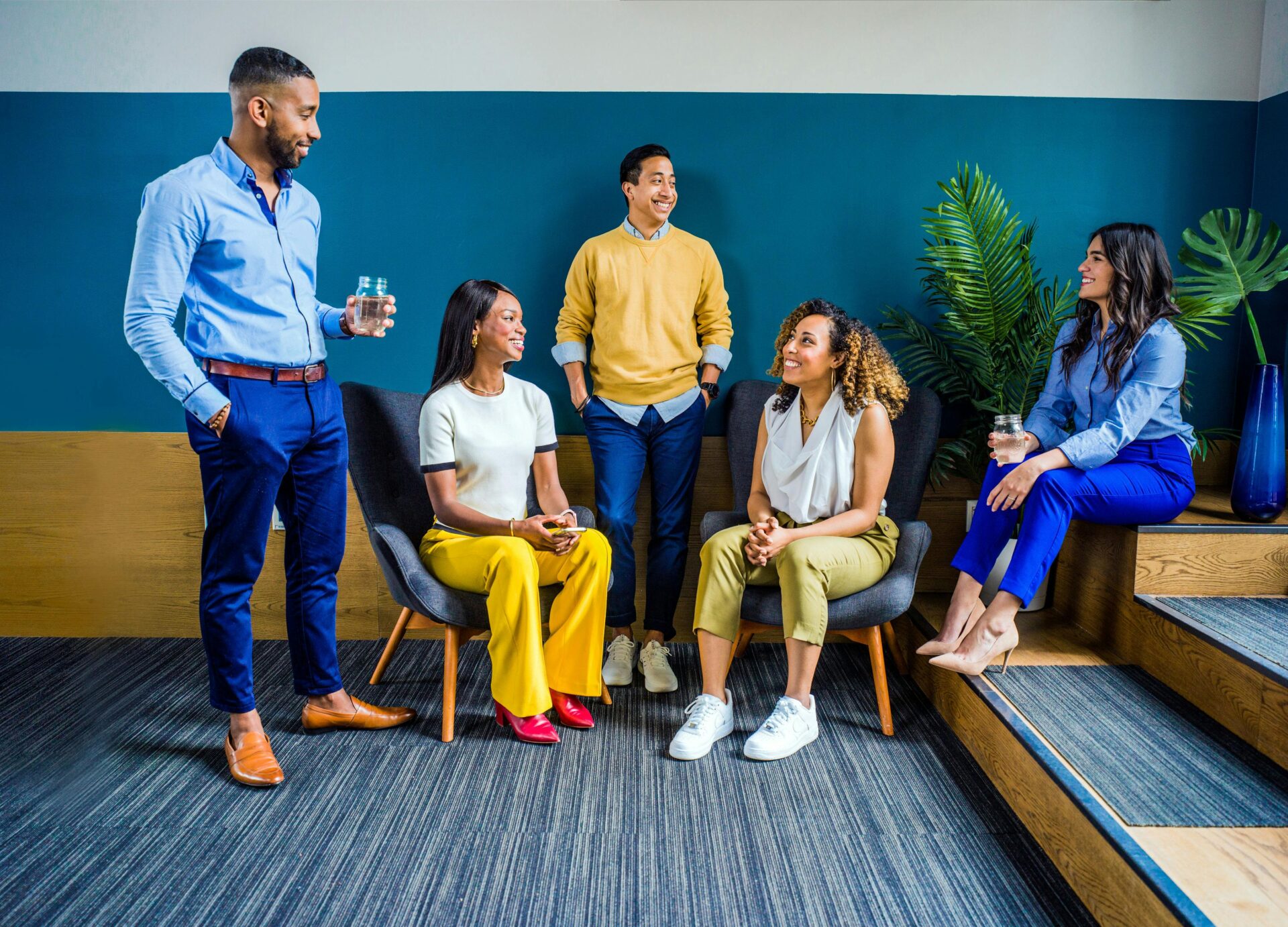 group-of-people-near-wall