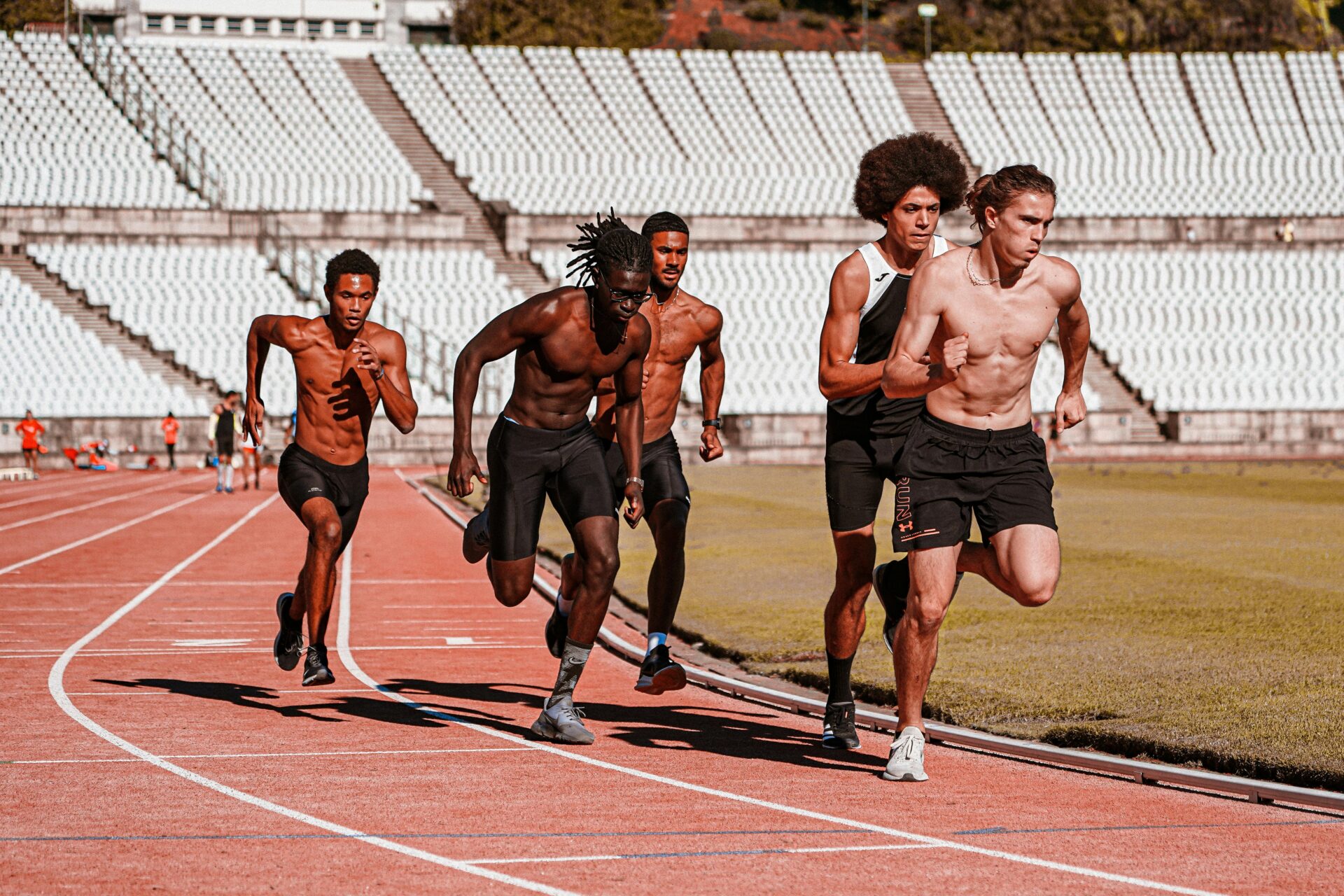 shirtless-men-running