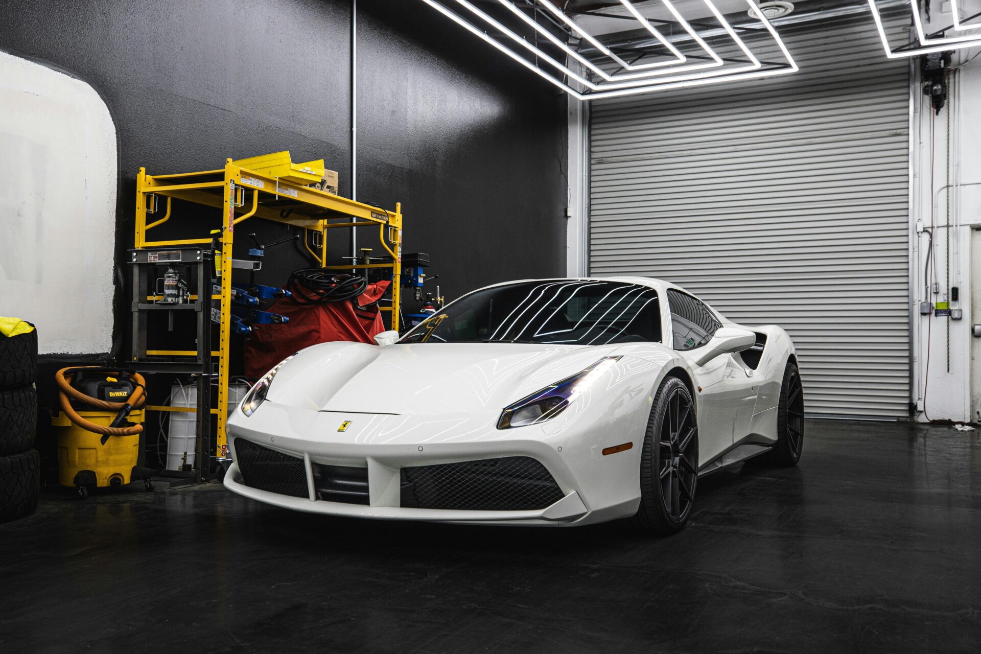 white-ferrari-inside-a-garage